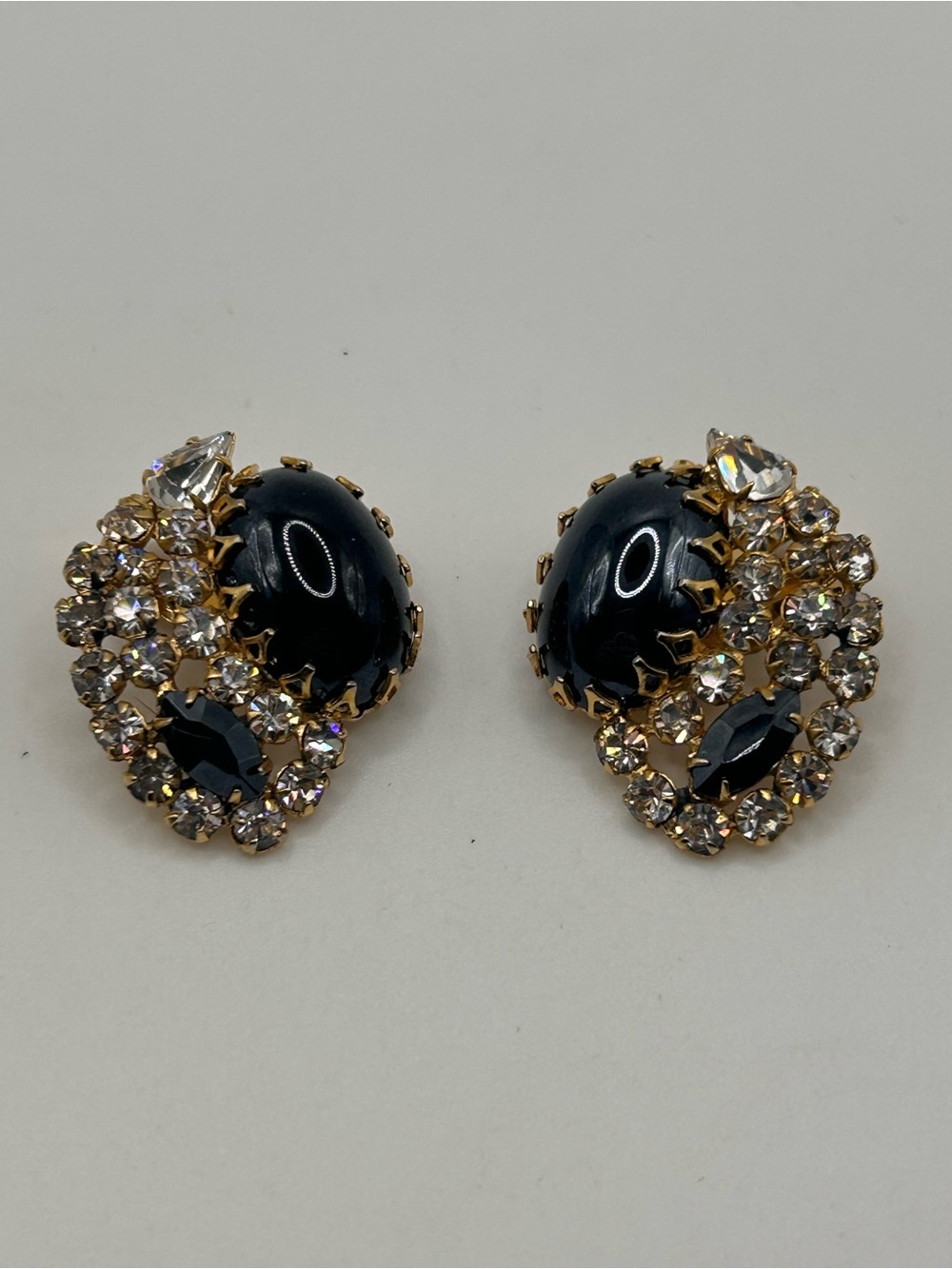 Vintage gold tone unsigned Schreiner matellic rhinestone clip earrings